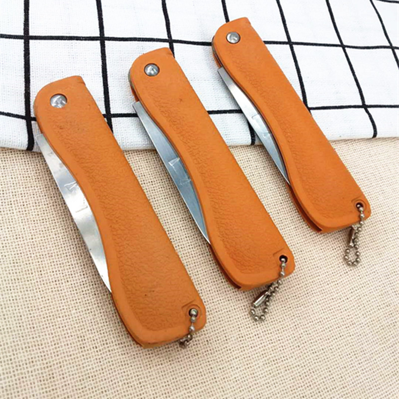 Factory direct sales of folding yellow sleeve knives, multi-functional folding knives, fruit knives wholesale two-yuan products pic 3