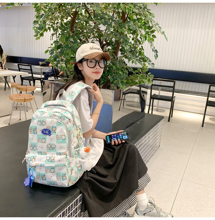 简约校园休闲背包2023韩版大容量休闲双肩包日系个性涂鸦学生书包详情17