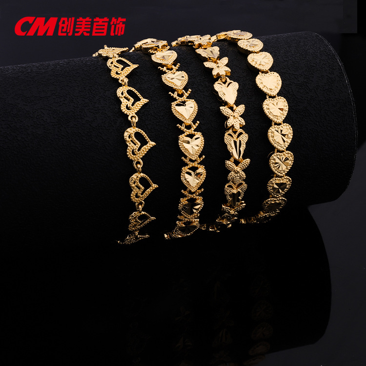 Chuangmei Jewelry offers wholesale 24K gold-plated heart-shaped butterfly bracelets for women, featuring a retro ethnic style and a luxurious wedding accessory pic 2