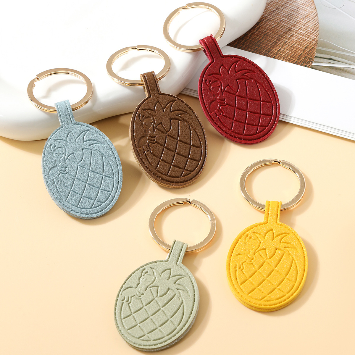 新款菠萝皮革钥匙扣便宜简约包包挂件汽车ins小众装饰品礼物详情3