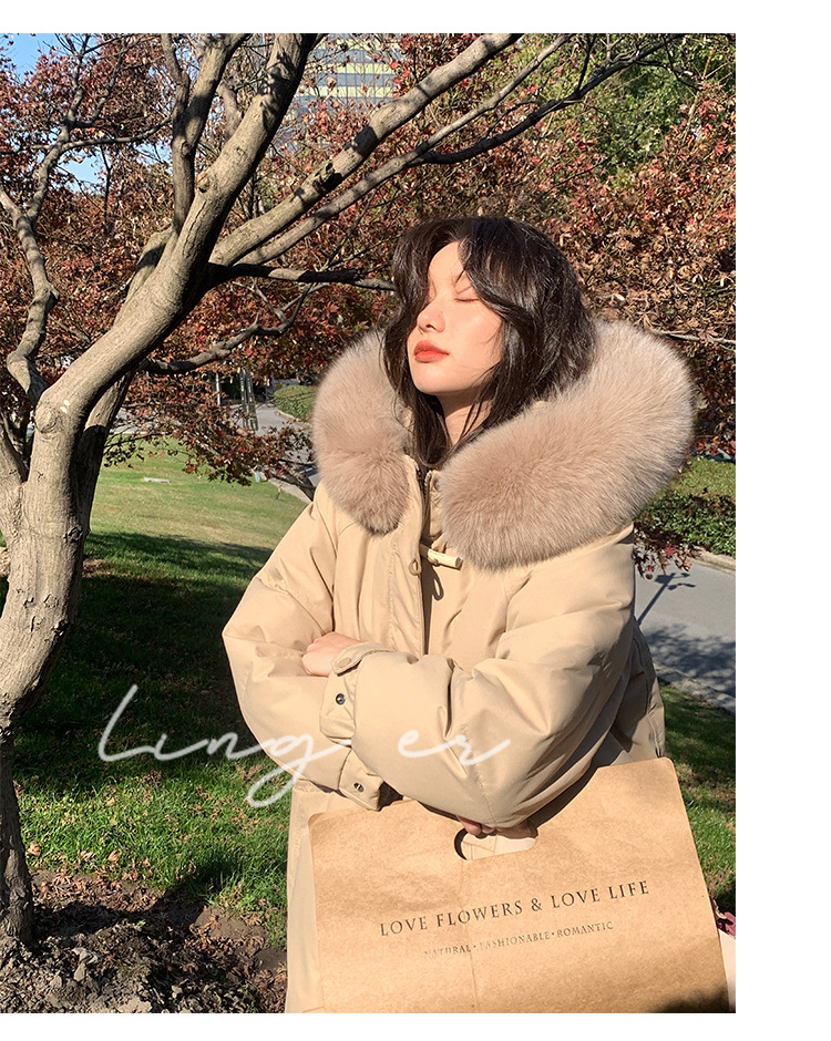 Wholesale of high-end mid-length down jackets for women that reach the knees in 2022, featuring a fashionable design sense and a niche thickened coat pic 18