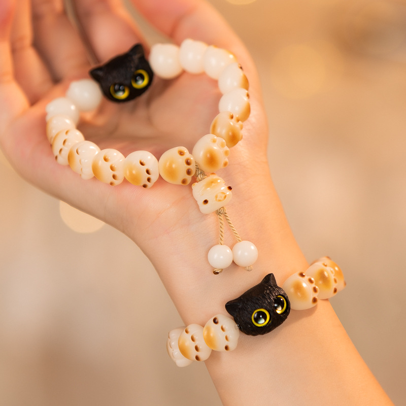 Charcoal-burned cat paw cat bracelet, female imitation white jade Bodhi seed, playful, soft Bodhi hand-held bracelet, live-streaming accessory pic 5