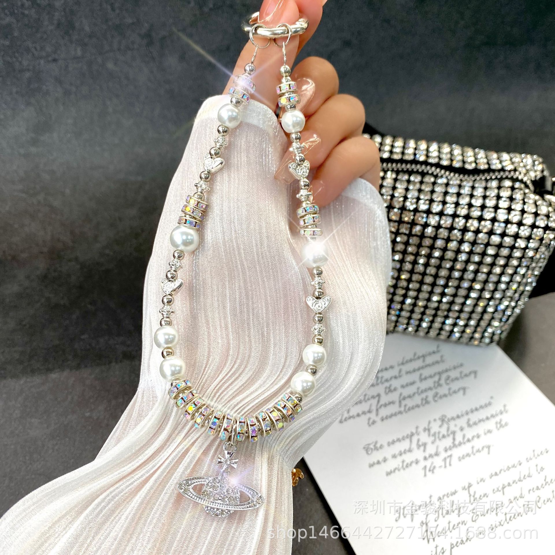 手机链条高级感 立体水晶蝴蝶结钥匙挂链 珍珠手机挂绳手腕款批发详情4