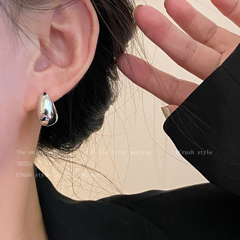 Wholesale of popular brushed frosted stud earrings for women with a light luxury and high-end InS-style, golden round stud earrings in the style of love beans pic 15