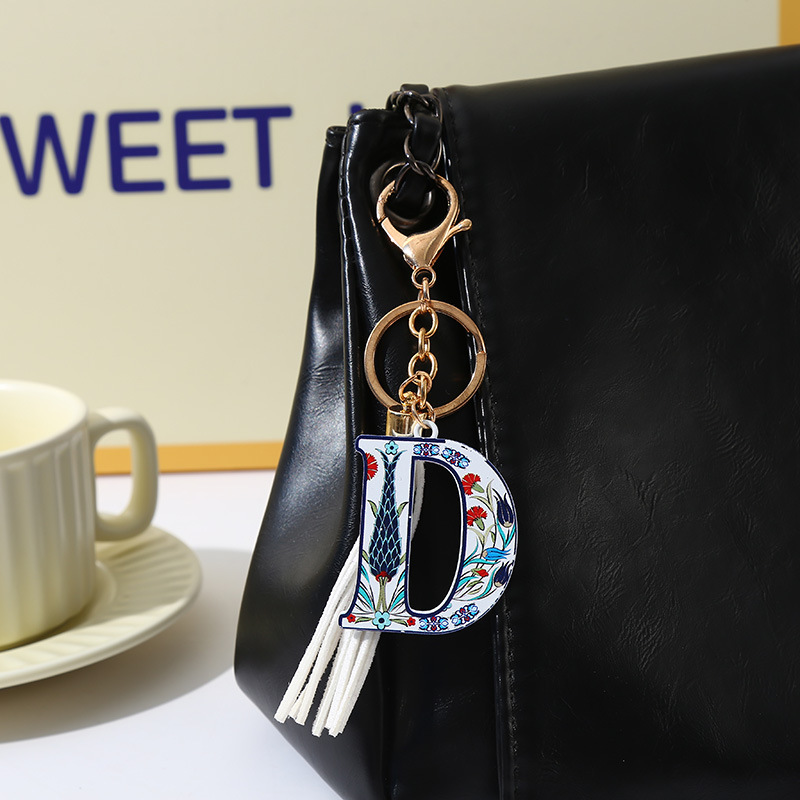 原创新款字母彩色流苏钥匙扣跨境专供配饰挂件流行包包挂件批发详情12