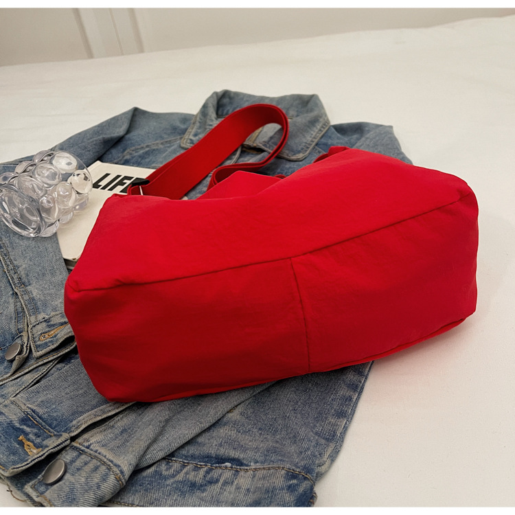 防水尼龙布袋斜挎包2024新款百搭饺子包简约百搭大容量上课单肩包详情18