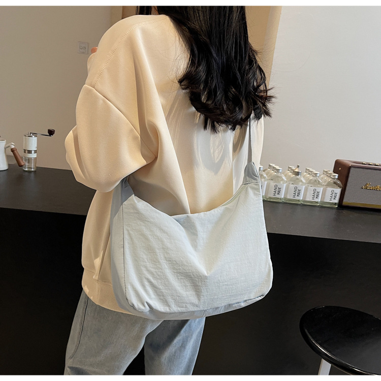 防水尼龙布袋斜挎包2024新款百搭饺子包简约百搭大容量上课单肩包详情33