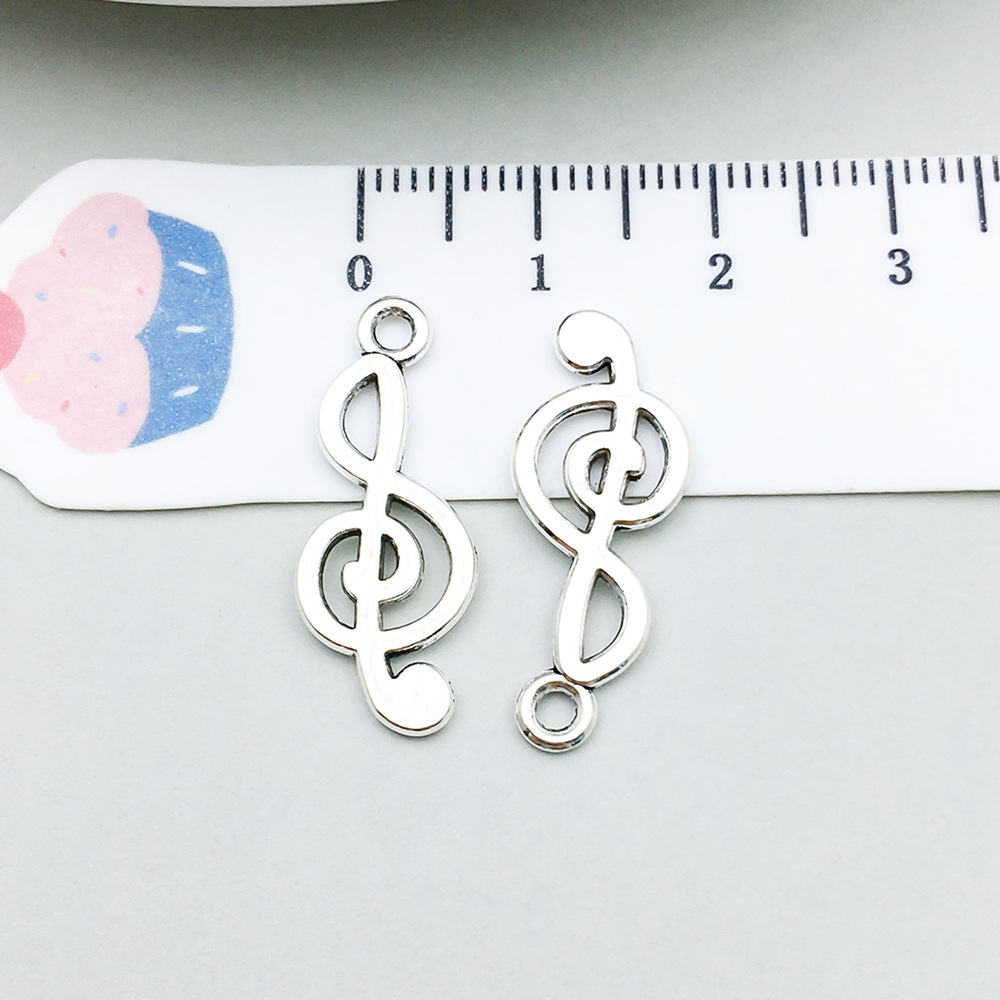 5619-Y-古银锌合金音乐音符号10x25-0.8g.pn
