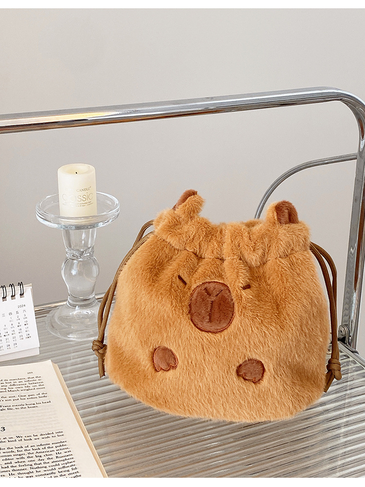 ✅ Cute plush kapibara drawstring pocket travel cosmetics camera polaroid storage bag hand pic 1