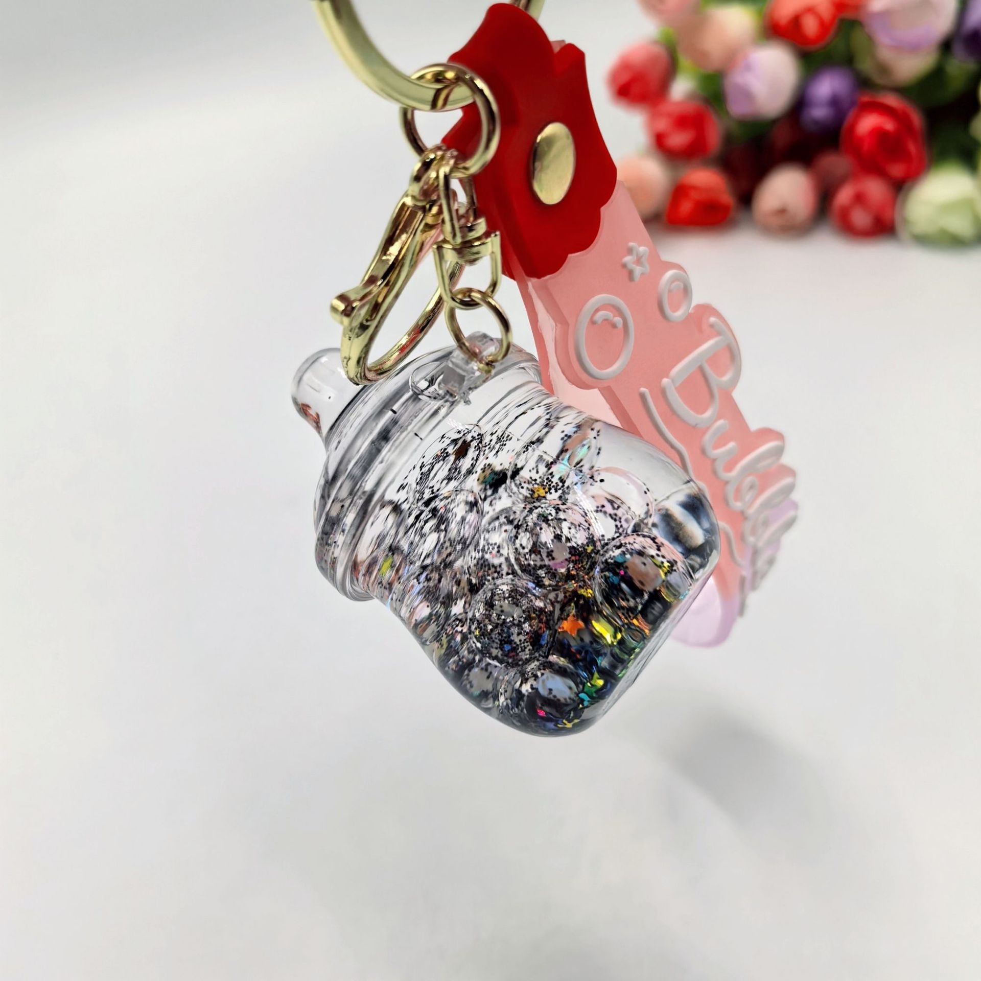 夜光泡泡珠流沙入油奶瓶钥匙扣挂件精品潮流包包挂饰创意礼品详情7