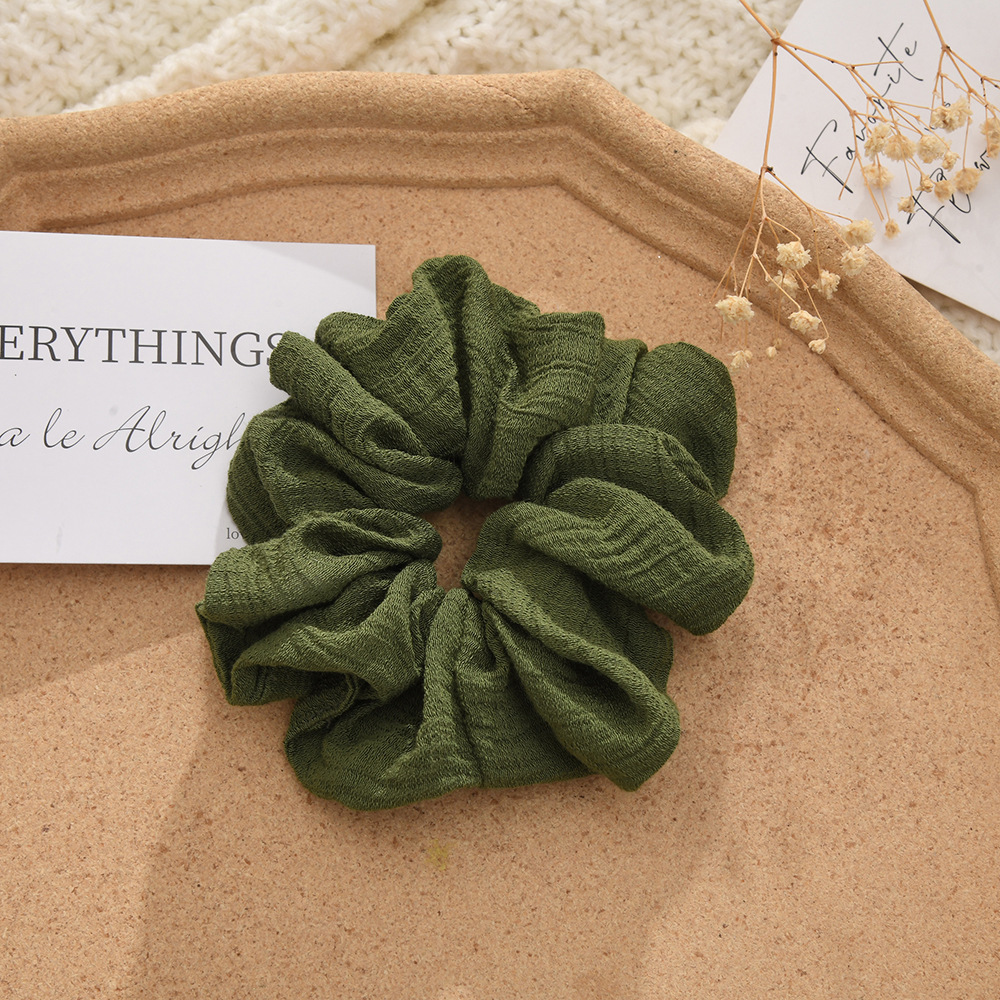 The new autumn and winter knitted cotton and linen solid-color large intestine hair band is versatile for tying ponytails, hair bands, hair accessories, bun hairstyles and hair ties pic 7