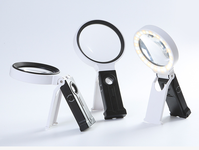 The new 7068 handheld folding dual-purpose magnifying glass with a lamp pic 10