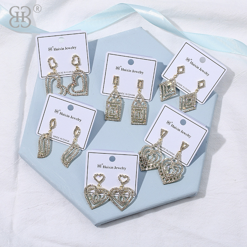 New French high-end heart-shaped diamond-encrusted light luxury earrings, exquisite, fashionable and versatile water diamond melon chain earrings wholesale pic 3