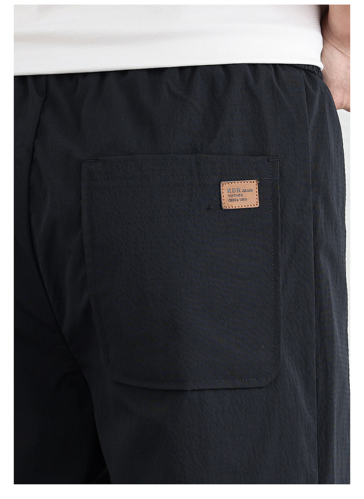 WOOG2005黑色男士弹力休闲长裤2025春夏季新款潮微宽松百搭直筒裤详情15