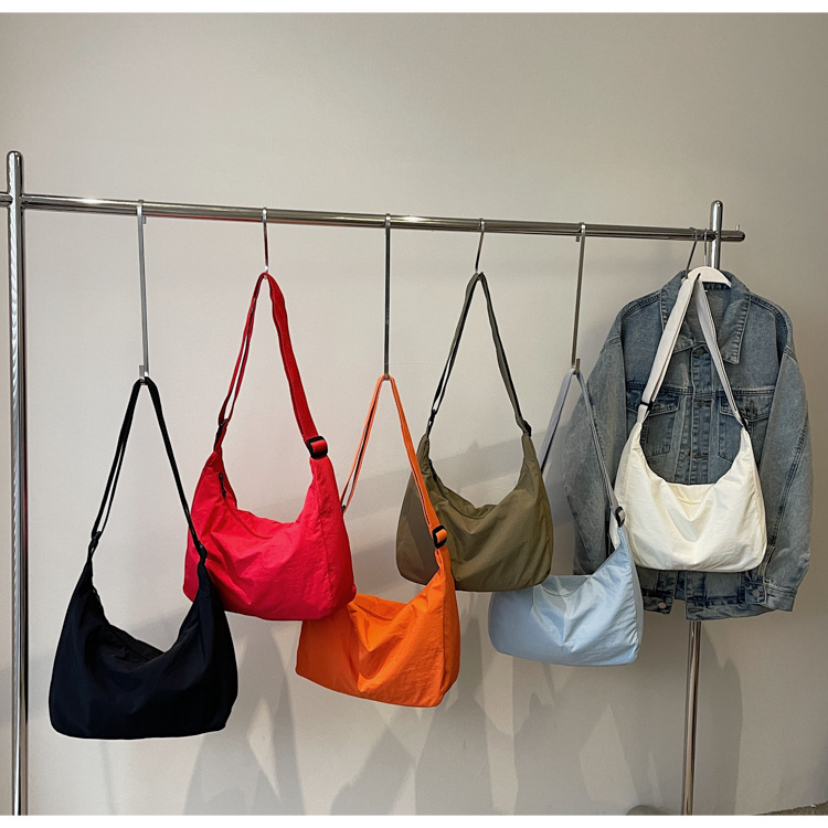 防水尼龙布袋斜挎包2024新款百搭饺子包简约百搭大容量上课单肩包详情14