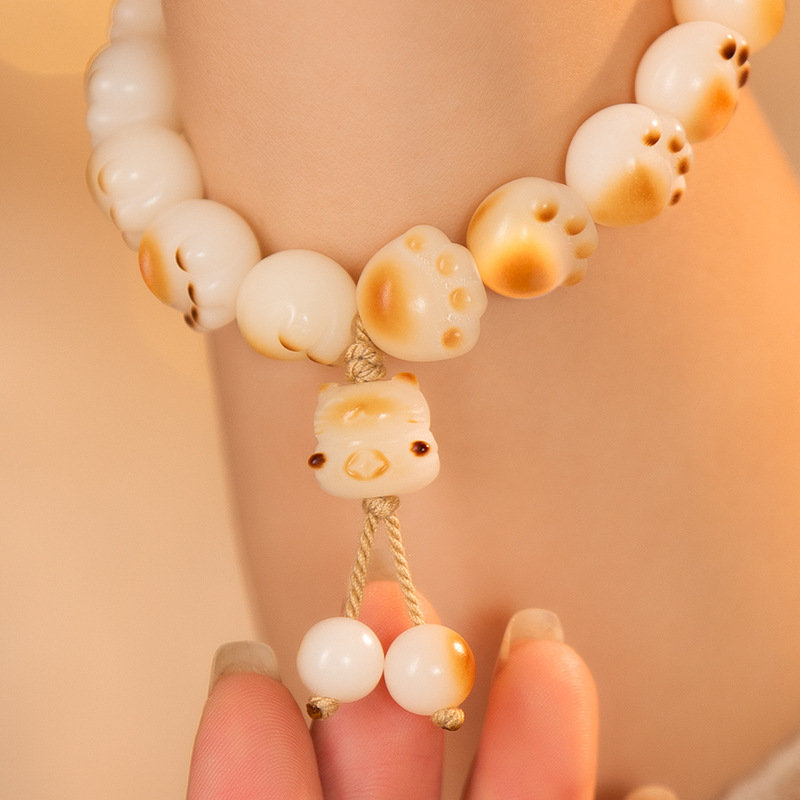 Charcoal-burned cat paw cat bracelet, female imitation white jade Bodhi seed, playful, soft Bodhi hand-held bracelet, live-streaming accessory pic 7