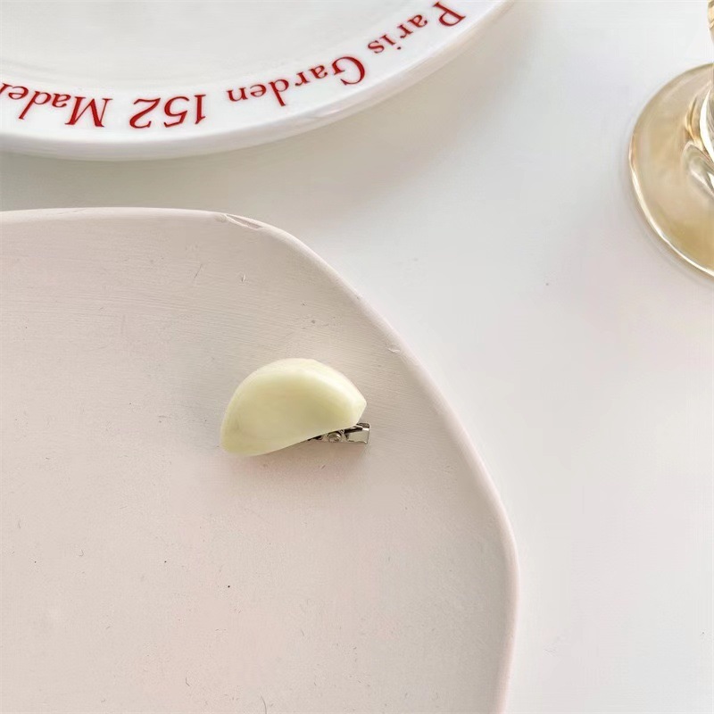 A funny and fun mini garlic hair clip, a bangs clip, and a creative garlic clove hair clip for your best friend as a gift and hair accessory pic 11