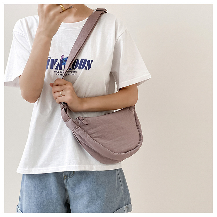 斜挎包女新款单肩包学生女包休闲包运动小包夏季帆布包日系饺子包详情23