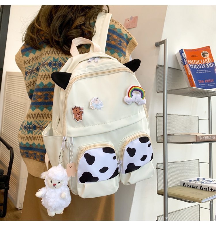 Japanese-style ins campus school style, fresh and cute, cute cow with earbuds, soft girl schoolbag, funny student backpack pic 7