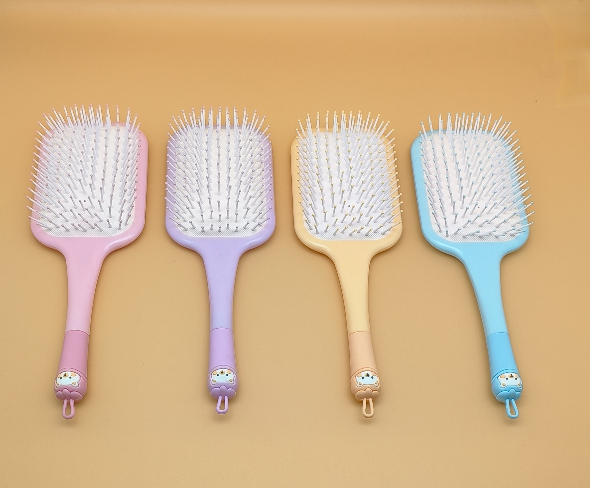 新款女生专用可爱卡通硅胶软头大方头气垫梳 蓬松造型气囊梳圆滚排骨梳 烧烤刷款式梳子详情6