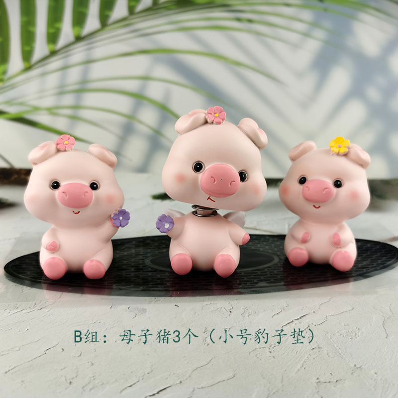 一件代发汽车香水摆件防滑垫树脂摇头公仔萌萌猪告白气球水晶座详情1