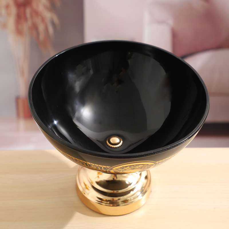 A new European-style black ceramic fruit plate for the living room table. The golden head fruit plate is an elegant and personalized light luxury ceramic decorative item pic 2