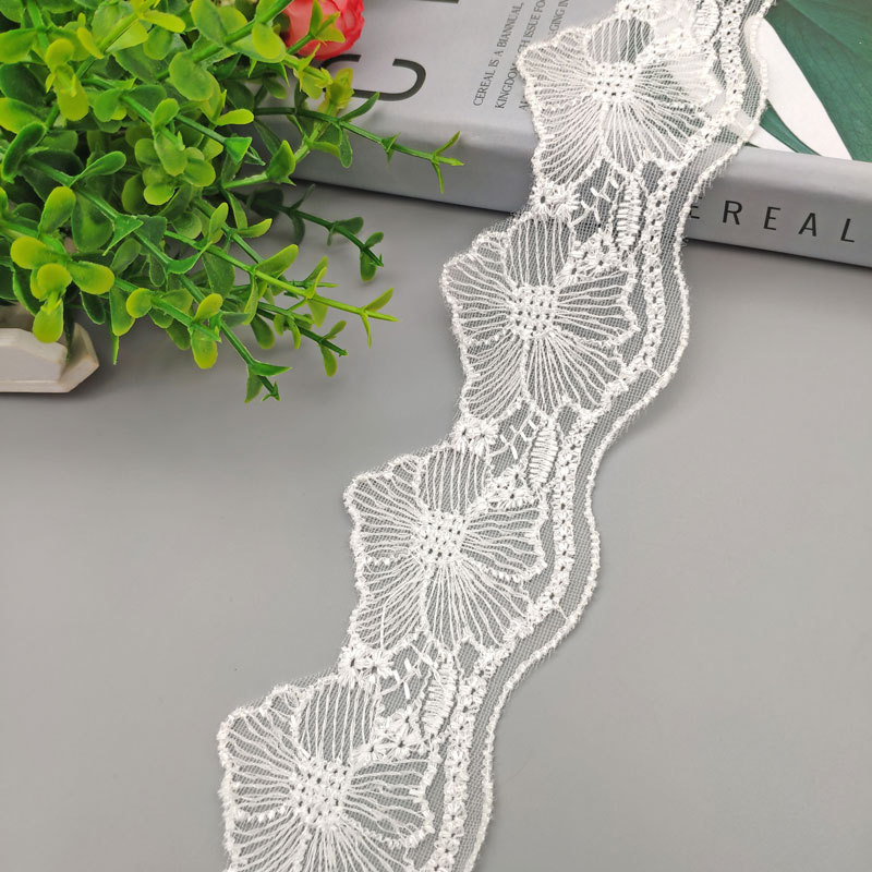 We have a wide range of products in stock, including lotus edge polyester thread embroidered lace, exquisite net lace, dance costumes, mosquito nets and decorative lace pic 10