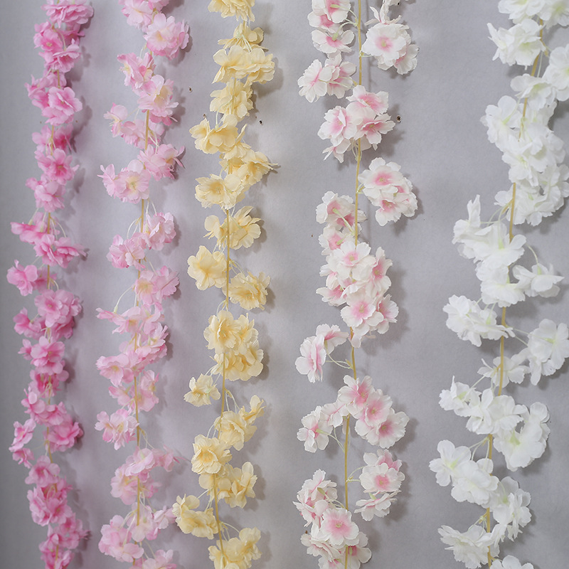 Cherry blossom vines entwined around air conditioning pipes, covering flower stalk trees, simulated peach blossoms, decorative flower vines, artificial flower vines pic 1