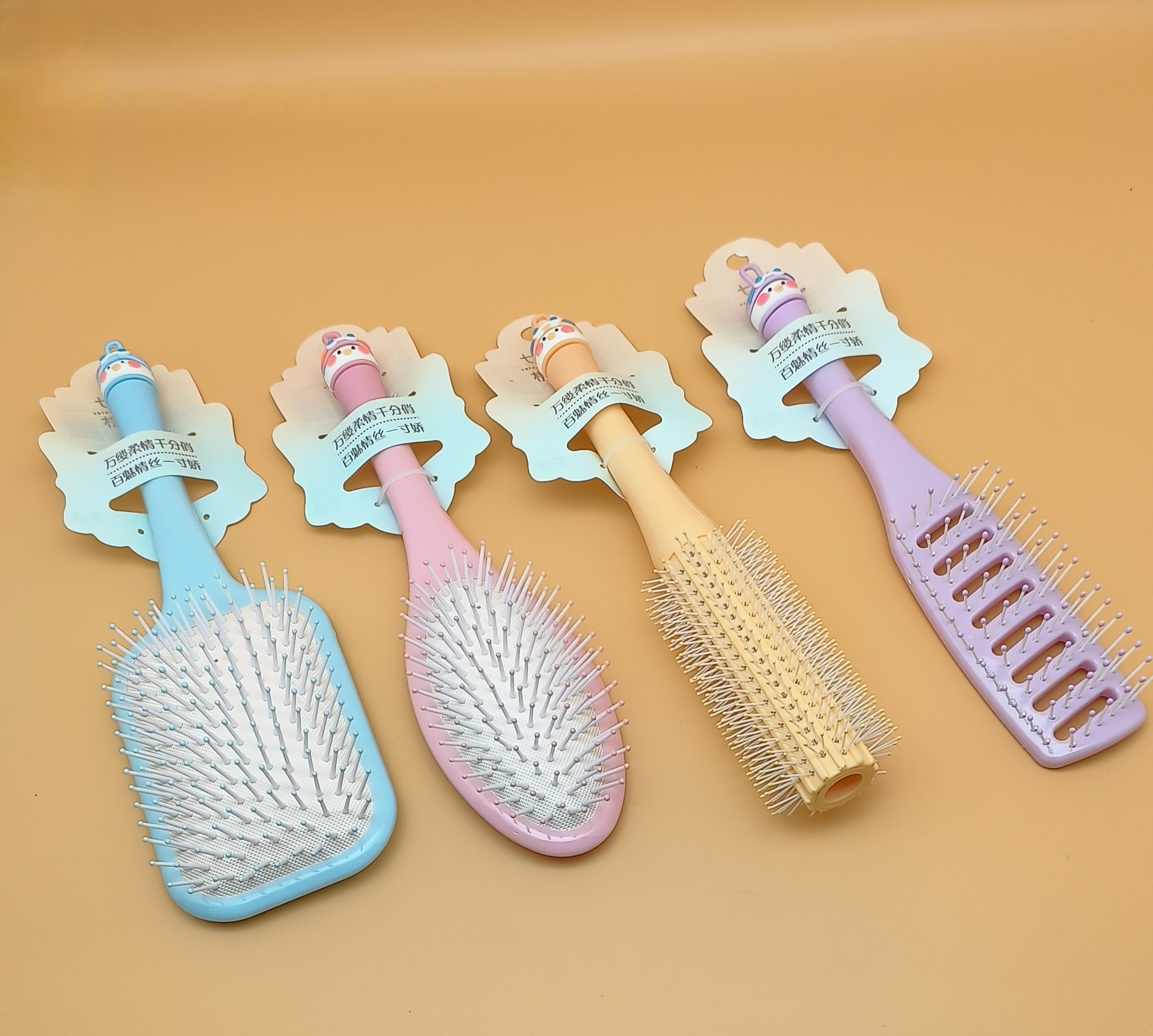 新款女生专用可爱卡通硅胶软头大方头气垫梳 蓬松造型气囊梳圆滚排骨梳 烧烤刷款式梳子详情34