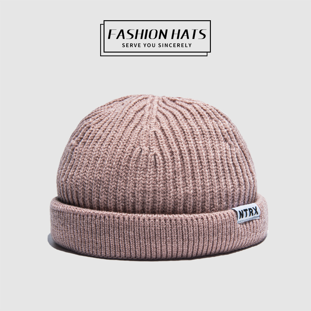 For the autumn and winter of 2021, men and women are wearing Korean-style outdoor casual hats without brims, with rolled edges and round top warp knitted caps pic 5