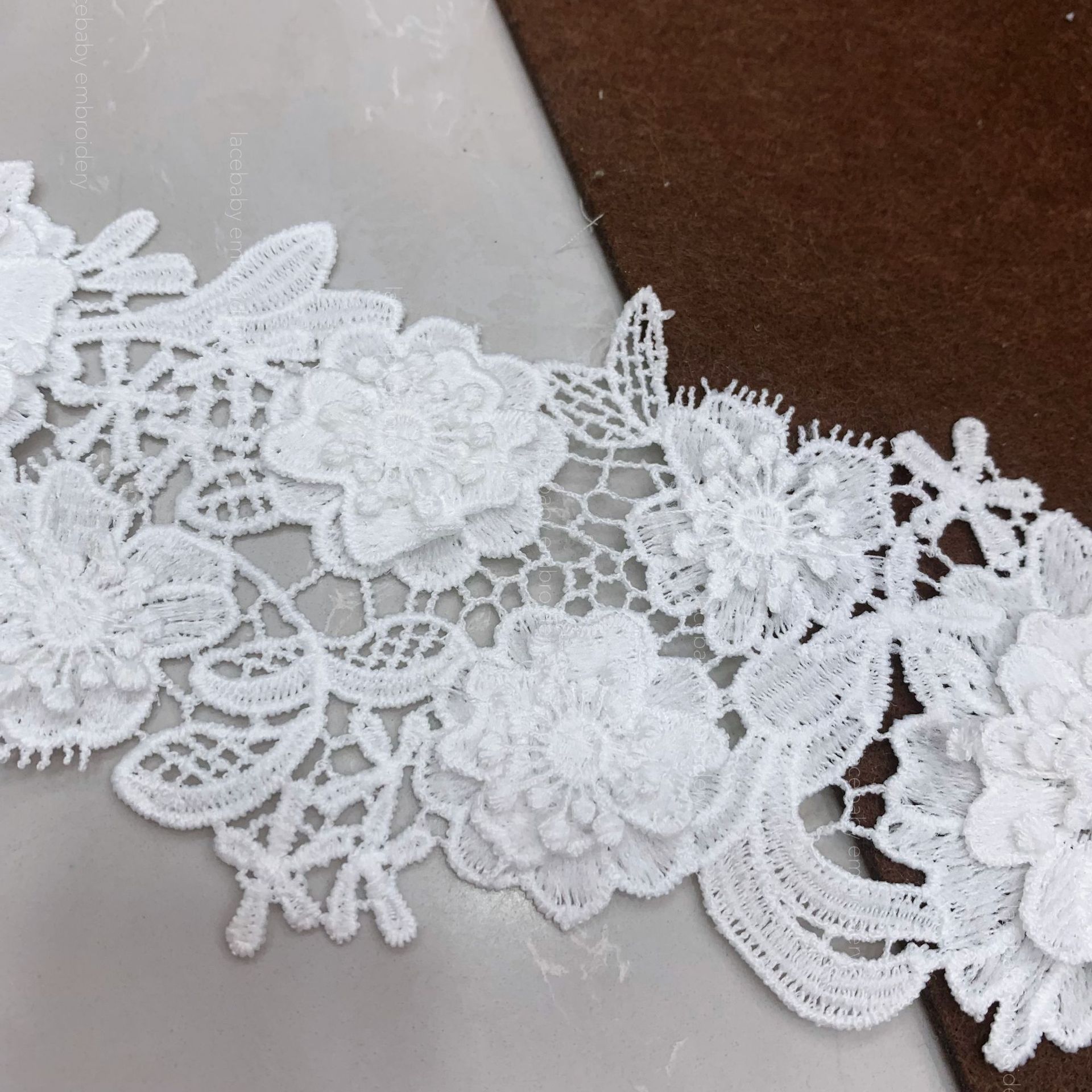 Three-dimensional lace milk silk polyester clothing accessories, home curtains and soft furnishings are available for wholesale from the manufacturer. Water-soluble lace pic 7