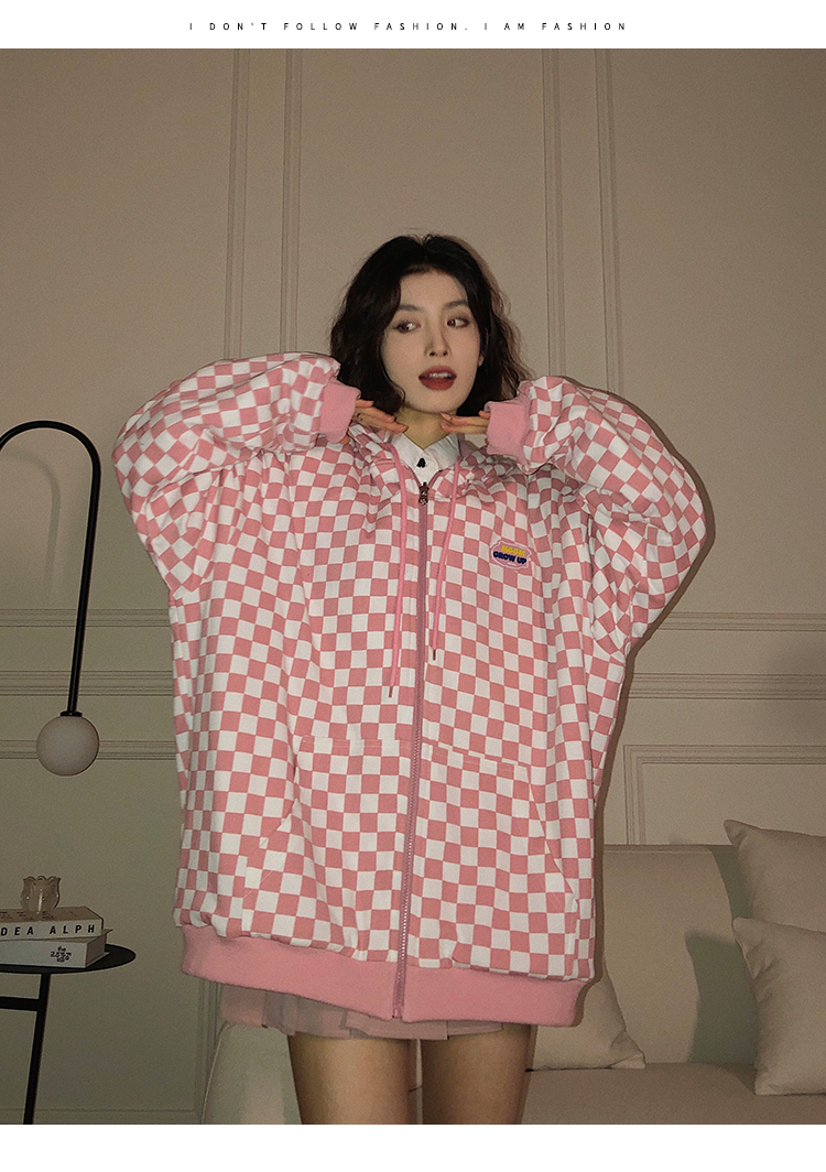 A woman wearing a cardigan with a hood on both sides in a loose pink, niche design with a checkered pattern is particularly stylish pic 31