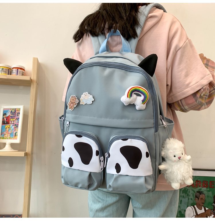 Japanese-style ins campus school style, fresh and cute, cute cow with earbuds, soft girl schoolbag, funny student backpack pic 17