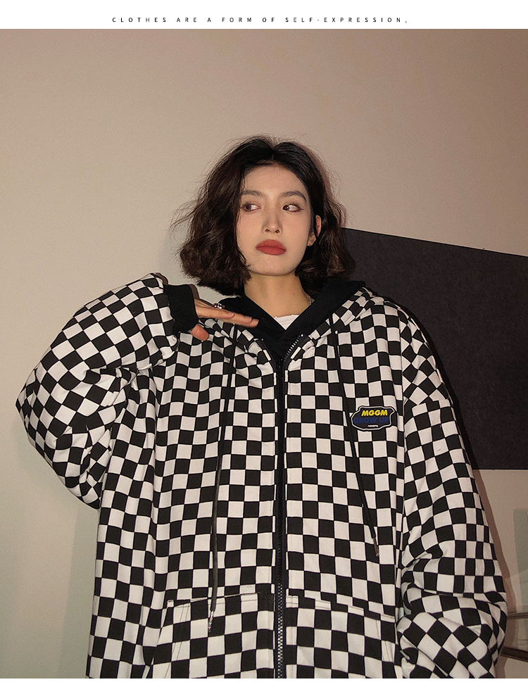 A woman wearing a cardigan with a hood on both sides in a loose pink, niche design with a checkered pattern is particularly stylish pic 13