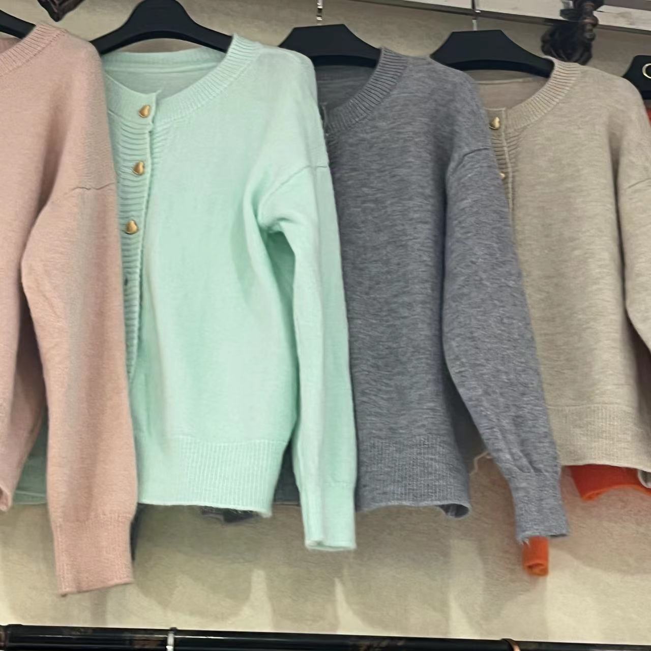 A gentle pink sweater with heart-shaped buttons for women in the spring and autumn of 2022, paired with a loose and sweet knitted cardigan jacket pic 23