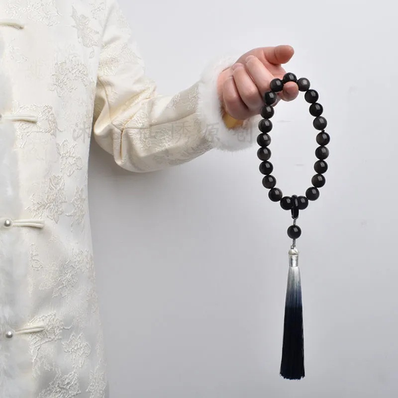 Qingqing Zijin holds a cultural and artistic bracelet that wraps around her fingers in a soft ancient style. This 18-seed prayer bead bracelet is a retro Hanfu accessory pic 29
