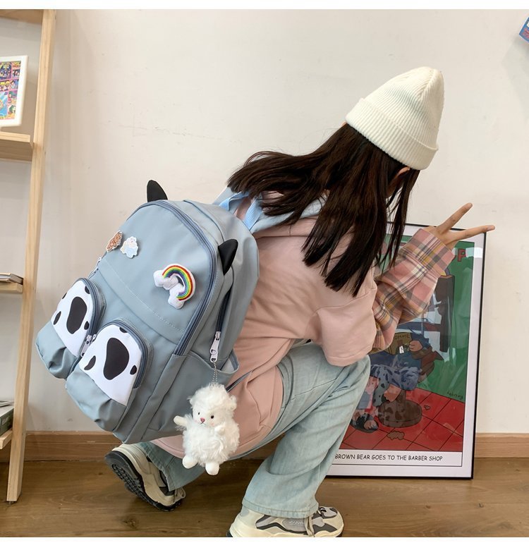 Japanese-style ins campus school style, fresh and cute, cute cow with earbuds, soft girl schoolbag, funny student backpack pic 10