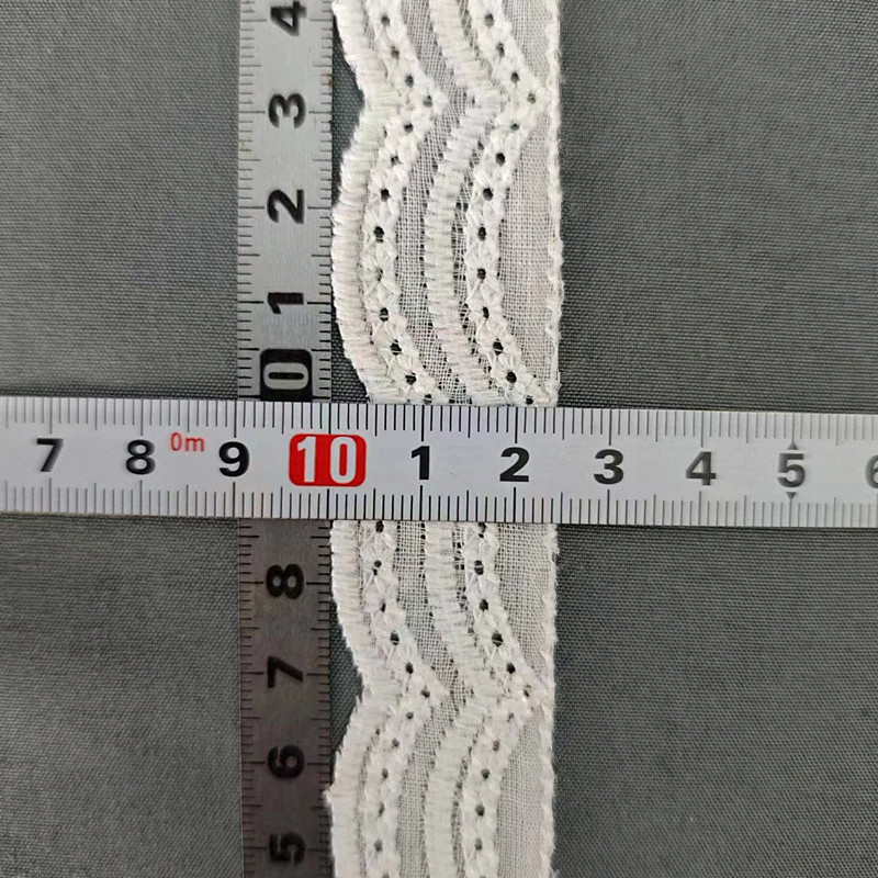 Wholesale of cotton embroidered lace, hollowed-out lace, embroidered skirt hem, clothing accessories, milk silk, perforated, barcode 2.5 pic 50