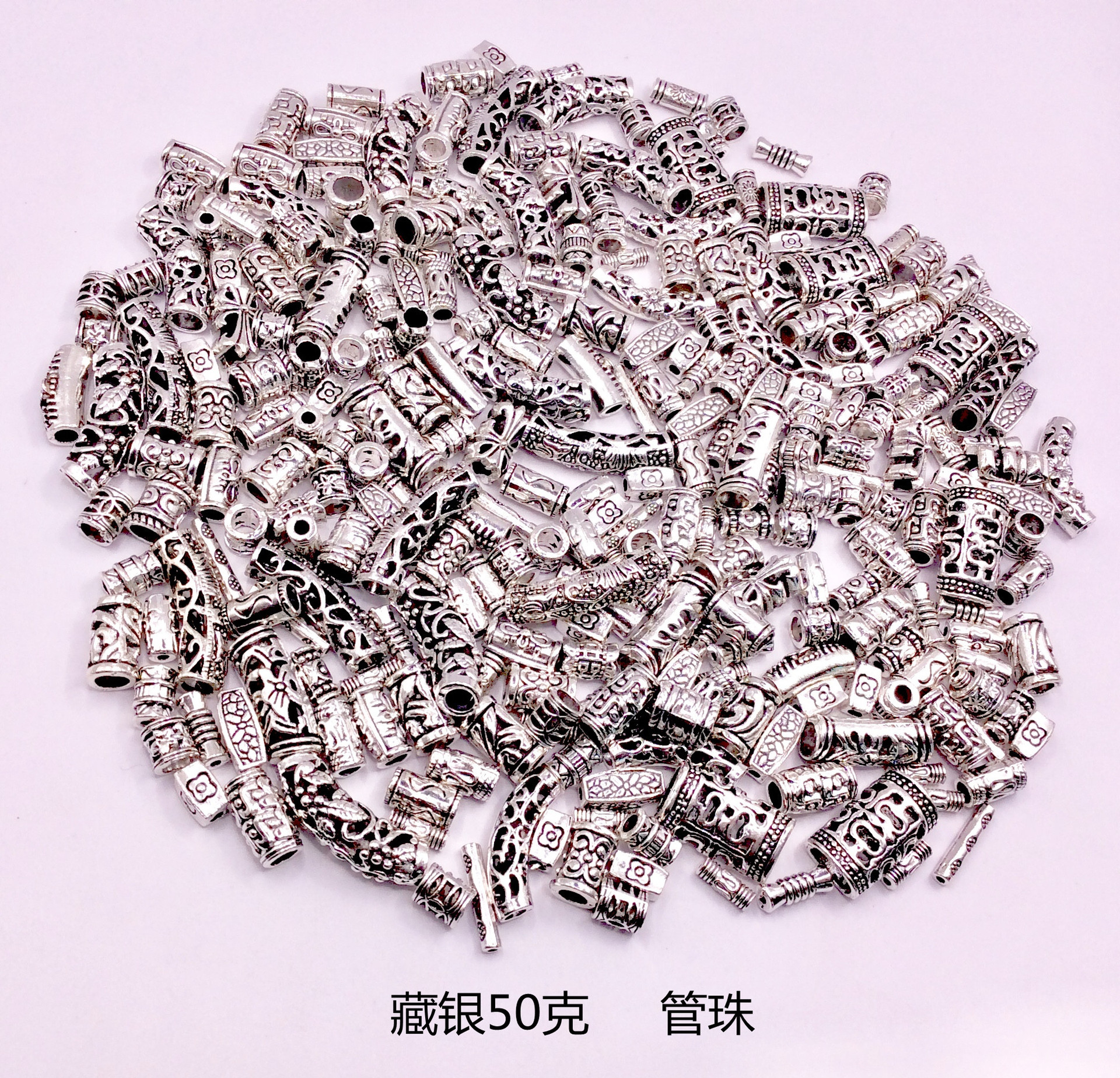 A 50g mixed bag of Tibetan silver bracelets, pendants, alloy jewelry accessories, diy flower trays, spacers, and drum beads pic 6