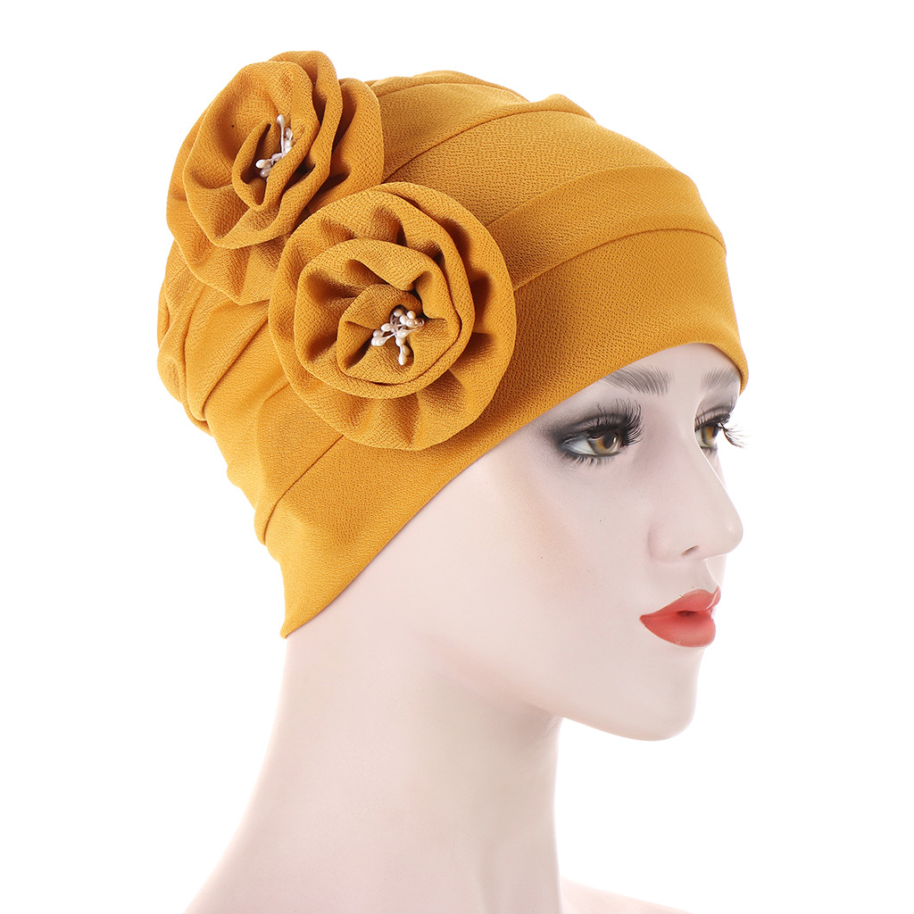 A new AliExpress style headscarf hat with two floral ribbons on the side and a flower core, a Muslim pullover hat pic 5