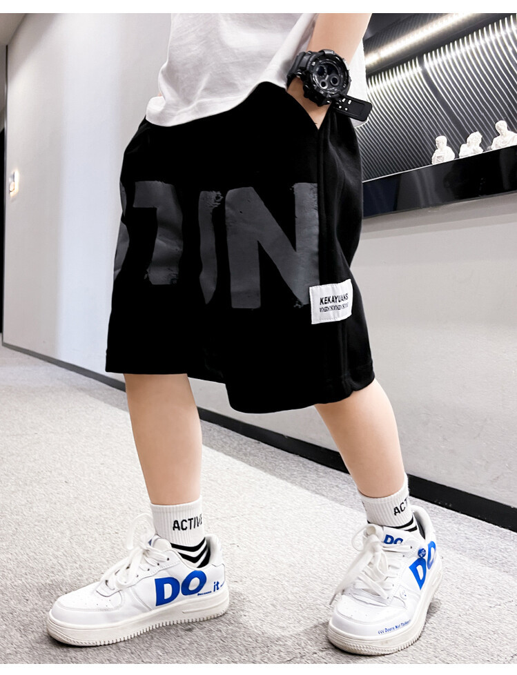 The 2022 new summer loose and stylish cotton capri shorts for boys are a trend of casual summer pants for middle-aged children pic 57