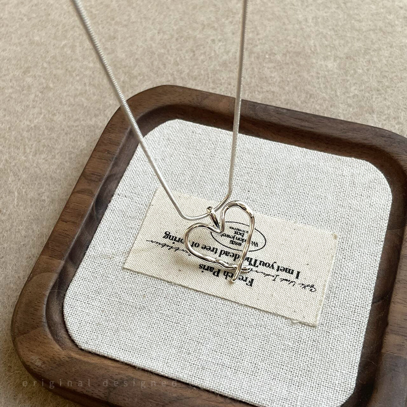 Cold and simple pull-out silver titanium steel snake bone necklace for women, 2025 new style, light luxury and high-end long sweater chain pic 1