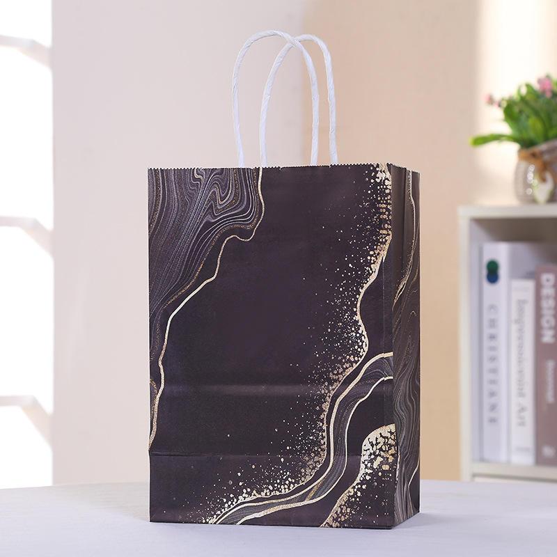 Factory wholesale of hand-held paper bags, kraft paper bags, party and party gift bags, gift bags, candy bags, customized pic 4