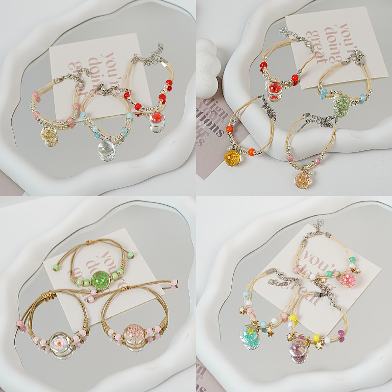 Cross-border Korean version popular and simple peach blossom bracelet, female forest style student dried flower accessories, street stall products, factory direct sales pic 1