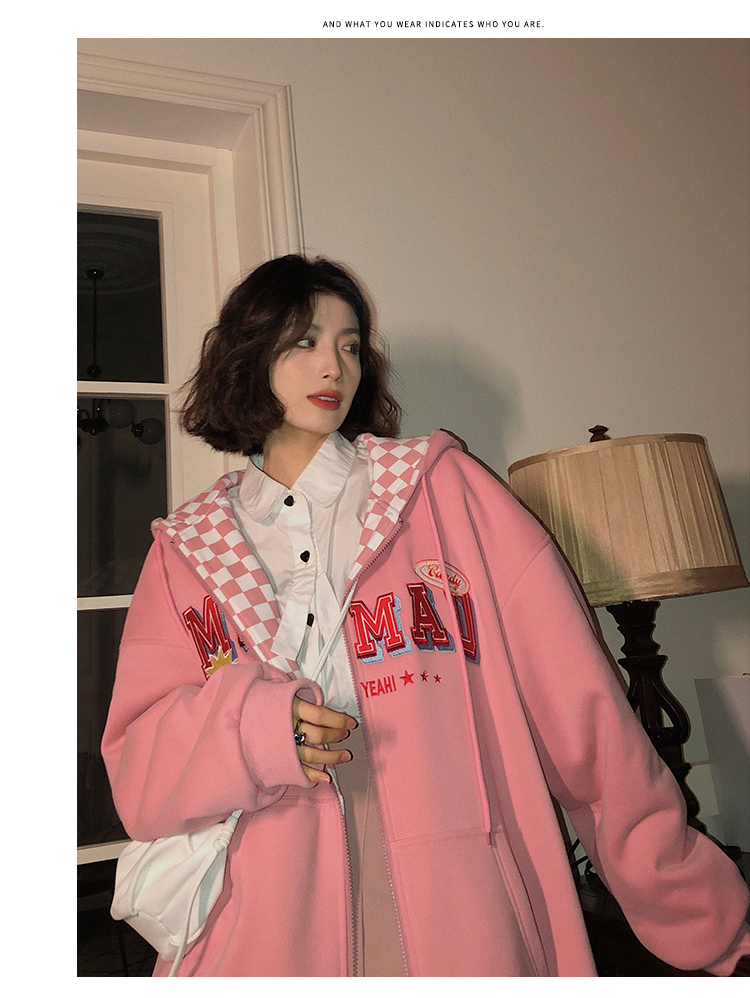 A woman wearing a cardigan with a hood on both sides in a loose pink, niche design with a checkered pattern is particularly stylish pic 27