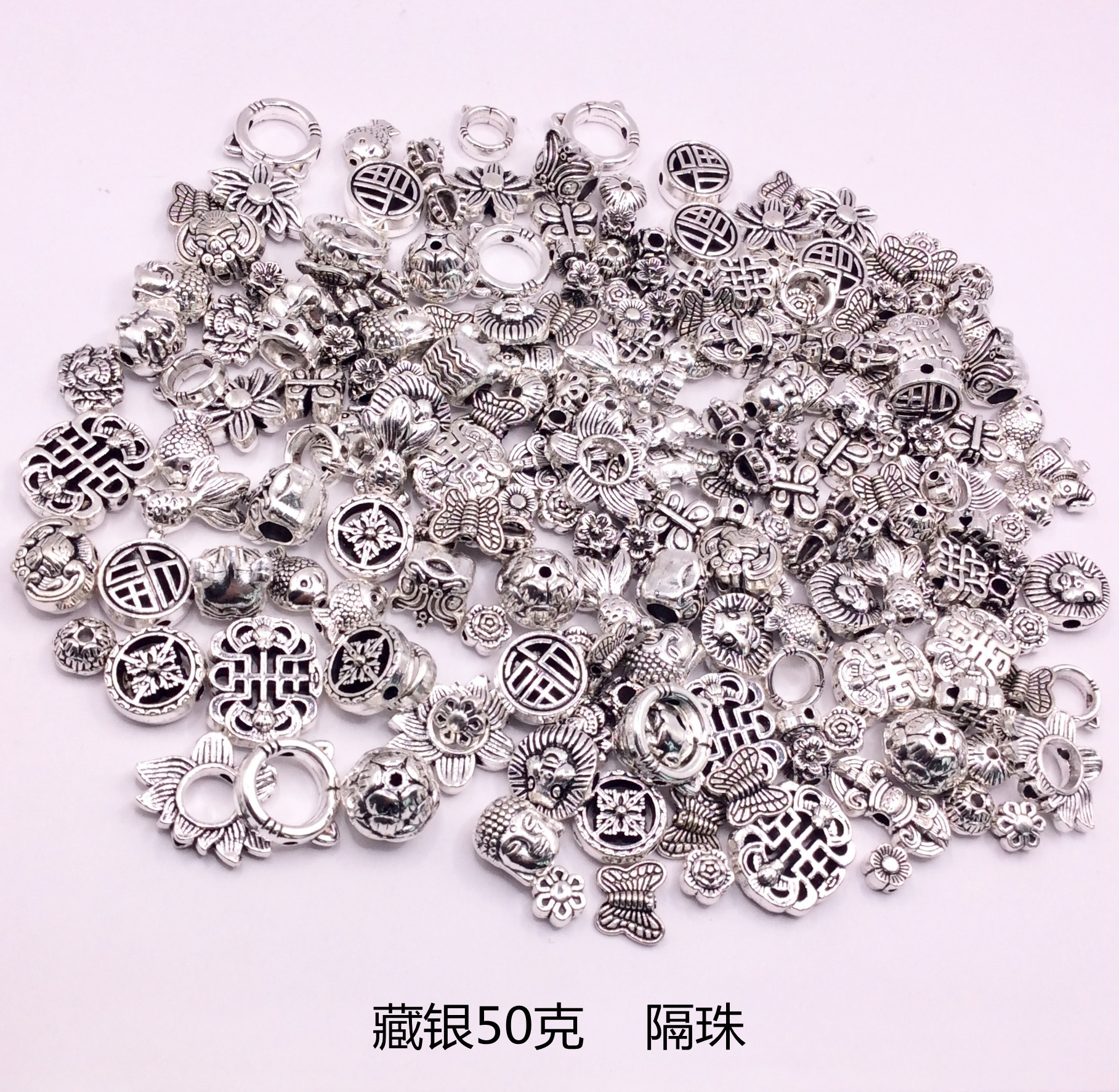 A 50g mixed bag of Tibetan silver bracelets, pendants, alloy jewelry accessories, diy flower trays, spacers, and drum beads pic 3