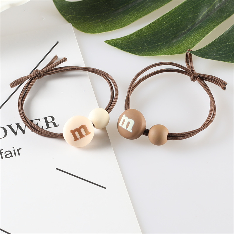 Korean version of the popular ins milk tea-colored M-bean hair band, high-elasticity hair tie rubber band, two-yuan store wholesale hair accessory supply pic 15