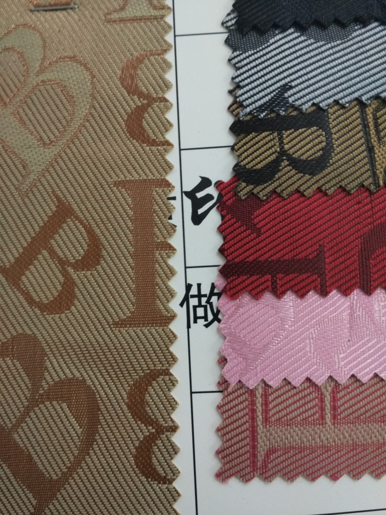 厂家直销多色提花B字母60丝羊皮纹提花发泡时尚背包手袋公文包详情3