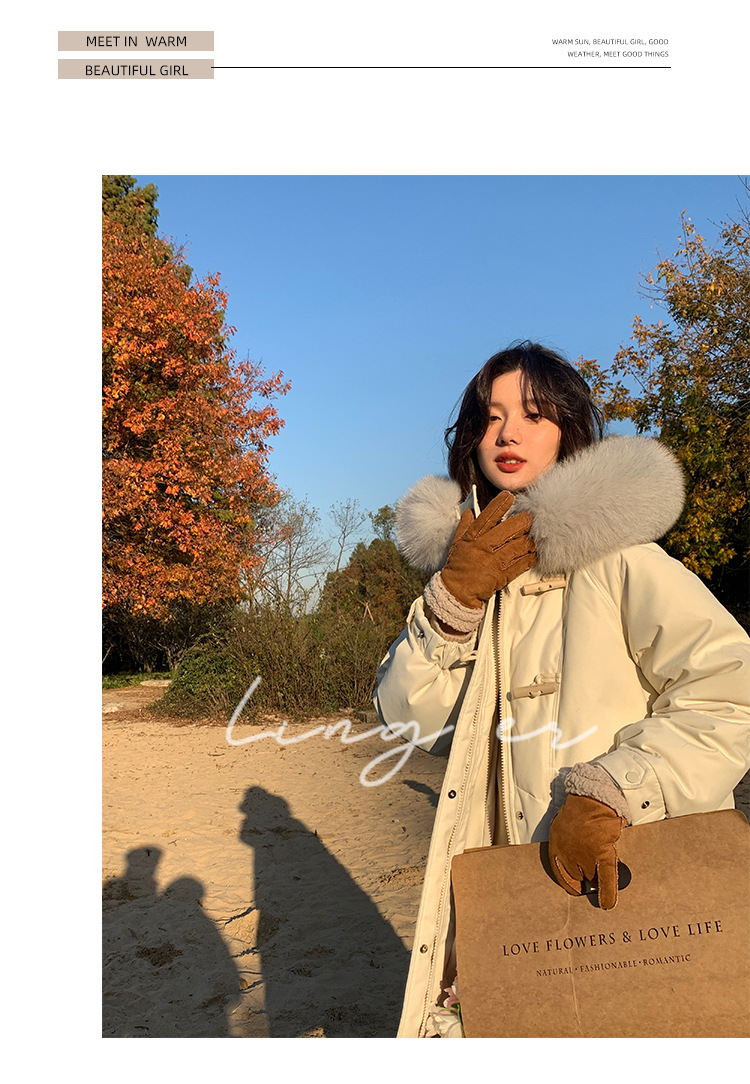 Wholesale of high-end mid-length down jackets for women that reach the knees in 2022, featuring a fashionable design sense and a niche thickened coat pic 23