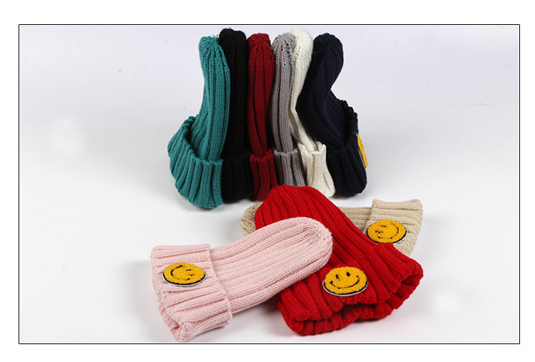 Wholesale of new Korean version winter interactive parent-child hats with warm and fashionable children's smiling faces from the manufacturer pic 23